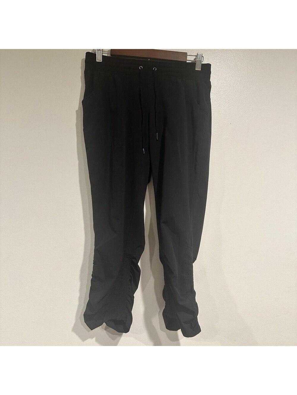 ATHLETA black Workout Pants size 8 cinched legs Pockets Drawstring Stretch Waist
